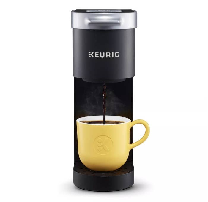 Black Keurig mini with yellow mug