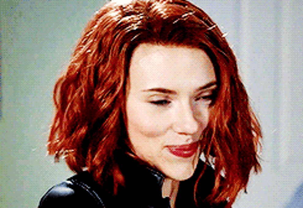Black Widow suggestively smiles