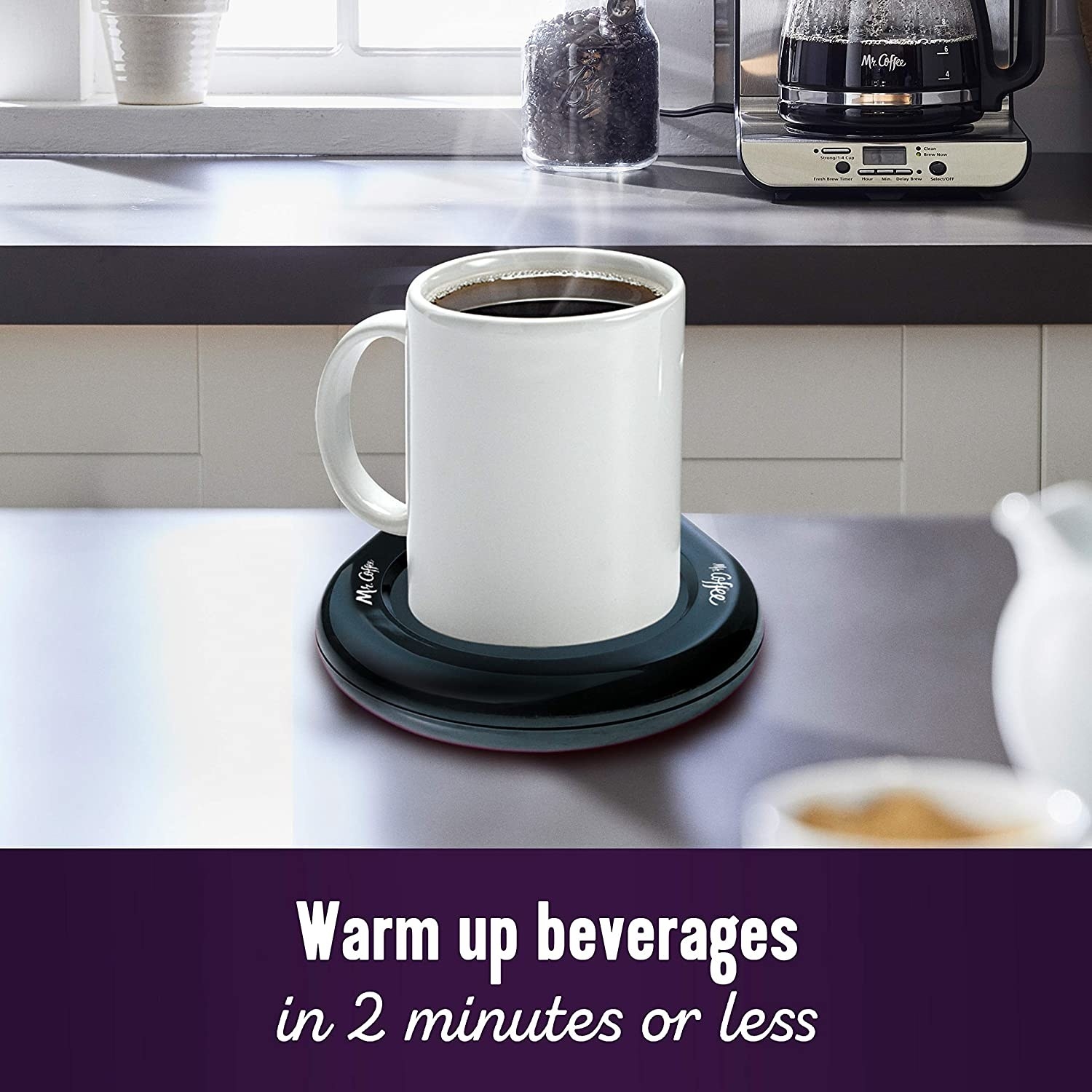 A cup of coffee on the beverage warmer.