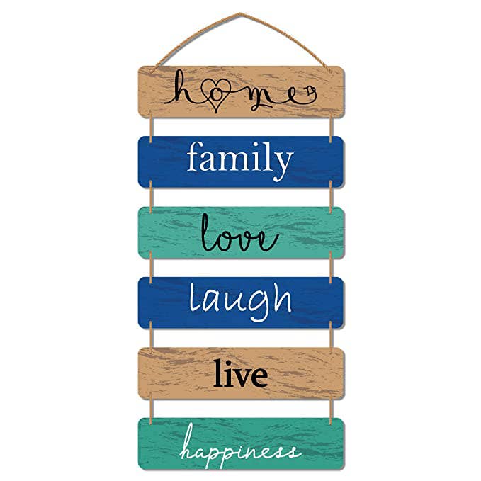 Wooden hanging with home, family, love, laugh, love and happiness printed on it.