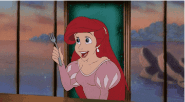 Ariel brushing her hair with a fork