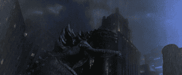 Godzilla roaring while lightning strikes