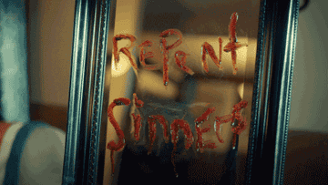a mirror says, in blood, repent sinners