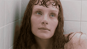 Woman smiling in tub