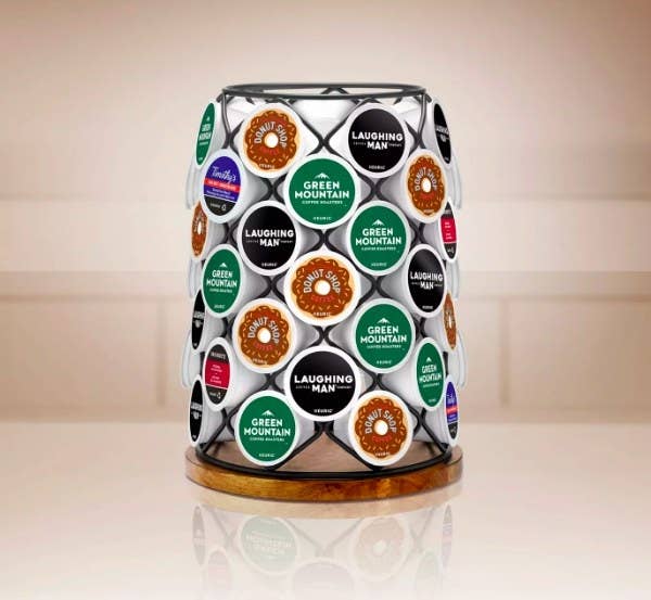 The carousel filled with various K-cup pods (Green Mountain, Dunkin, Laughing Man, Timothys)