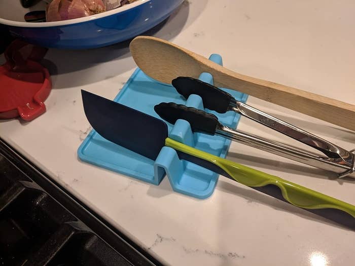 Reviewer&#x27;s photo of the utensil rest in the color Sky Blue