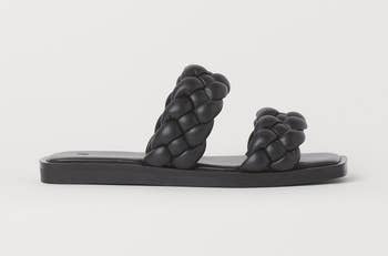 side view of the sandals in black