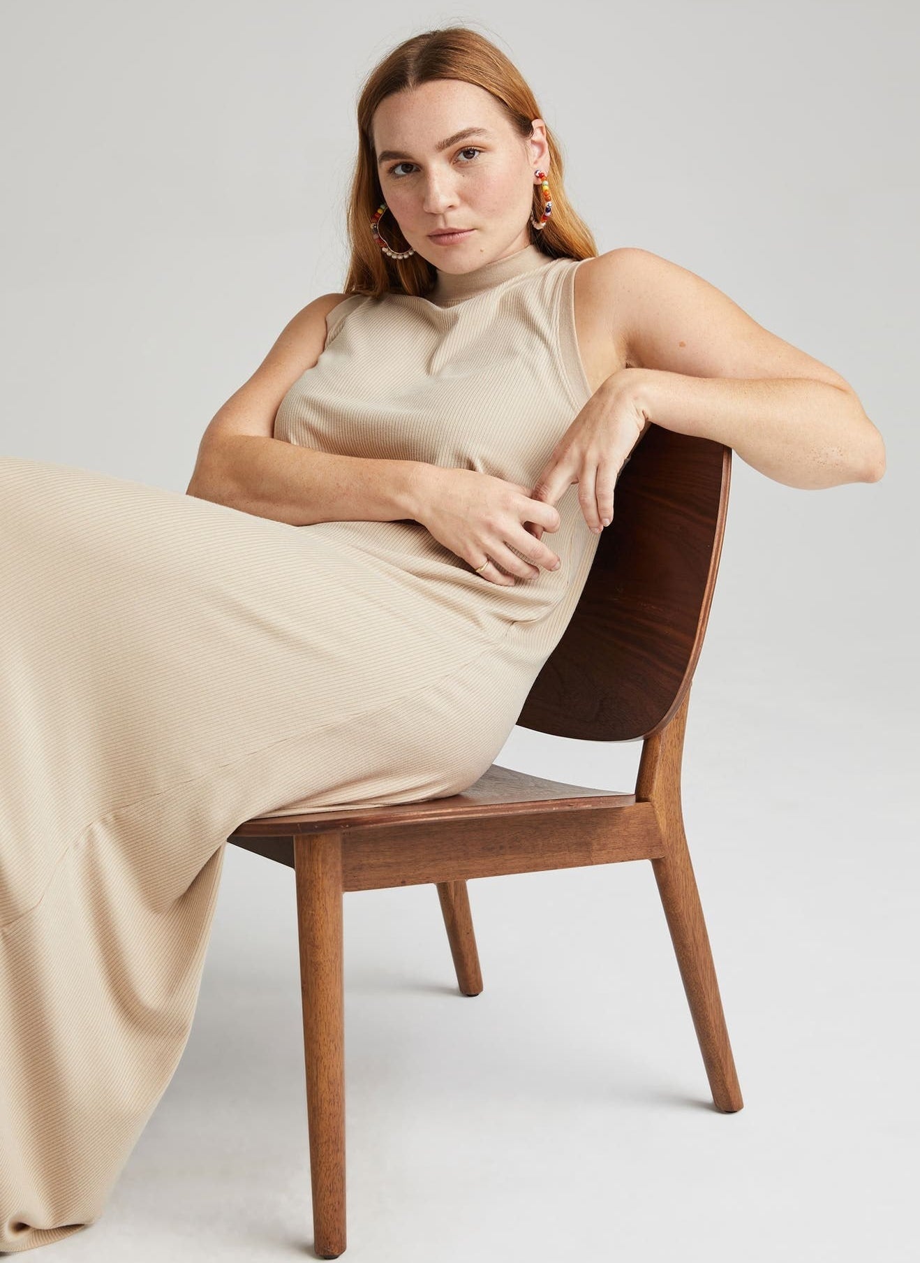 model wearing the taupe dress