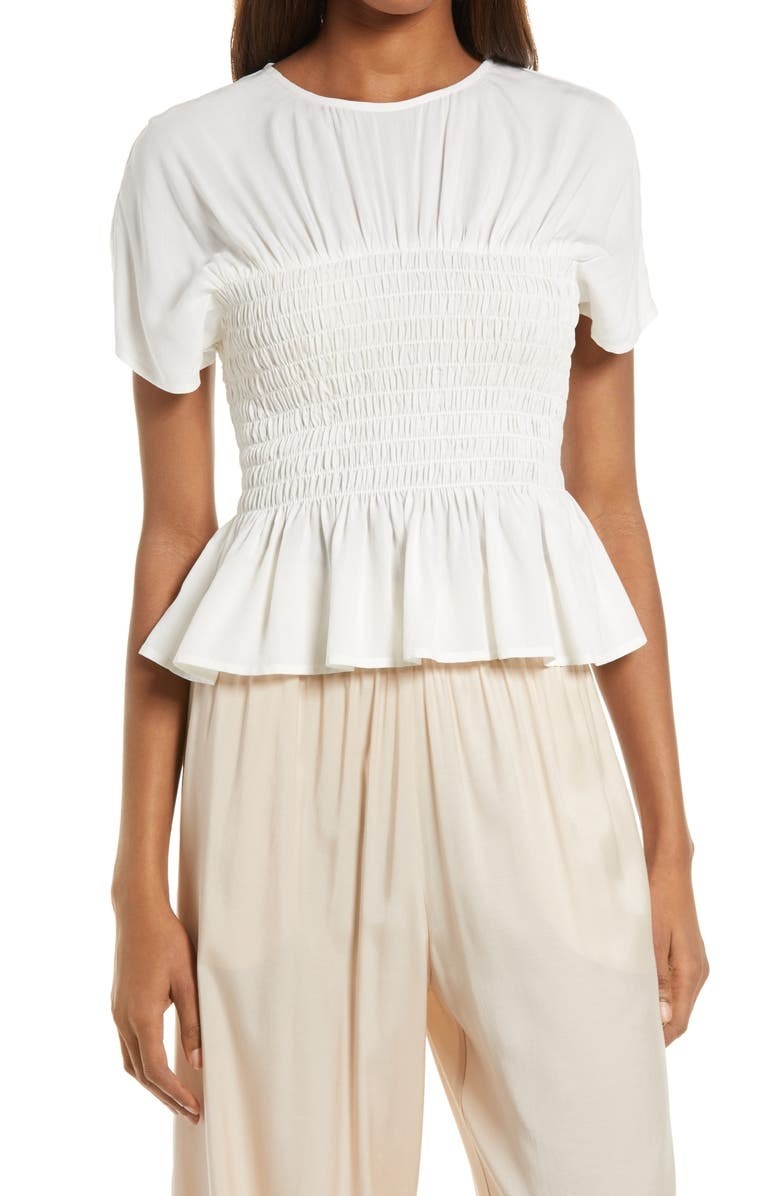 model wearing the white corset top