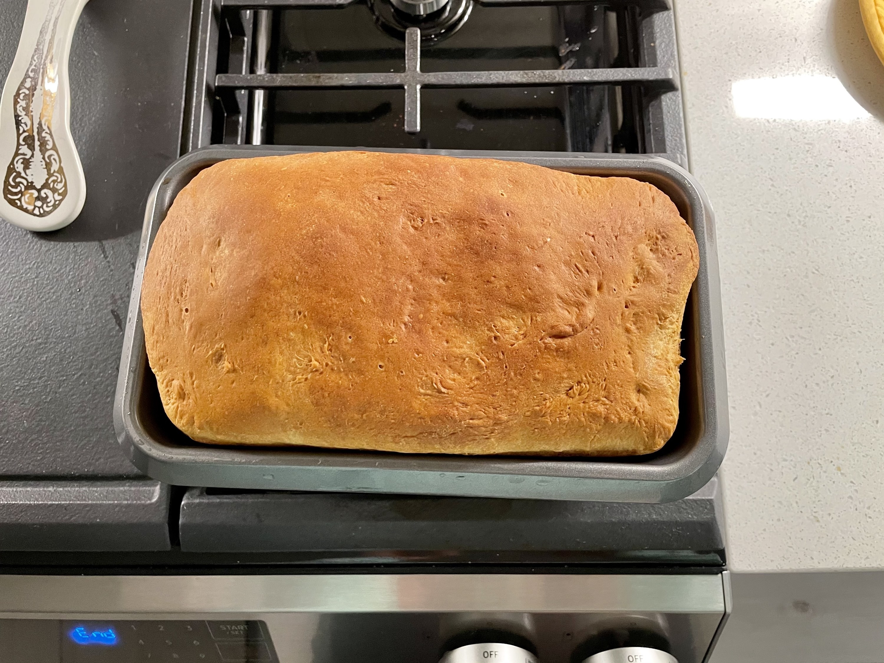 Baked dough in a loaf pan
