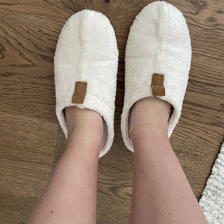 Ali wearing acorn slippers