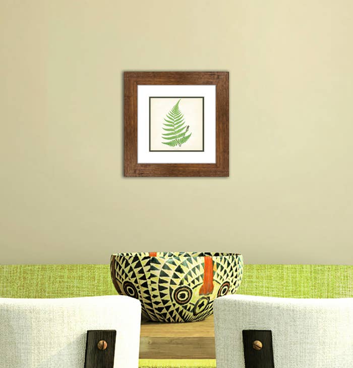 A green fern painting in a home