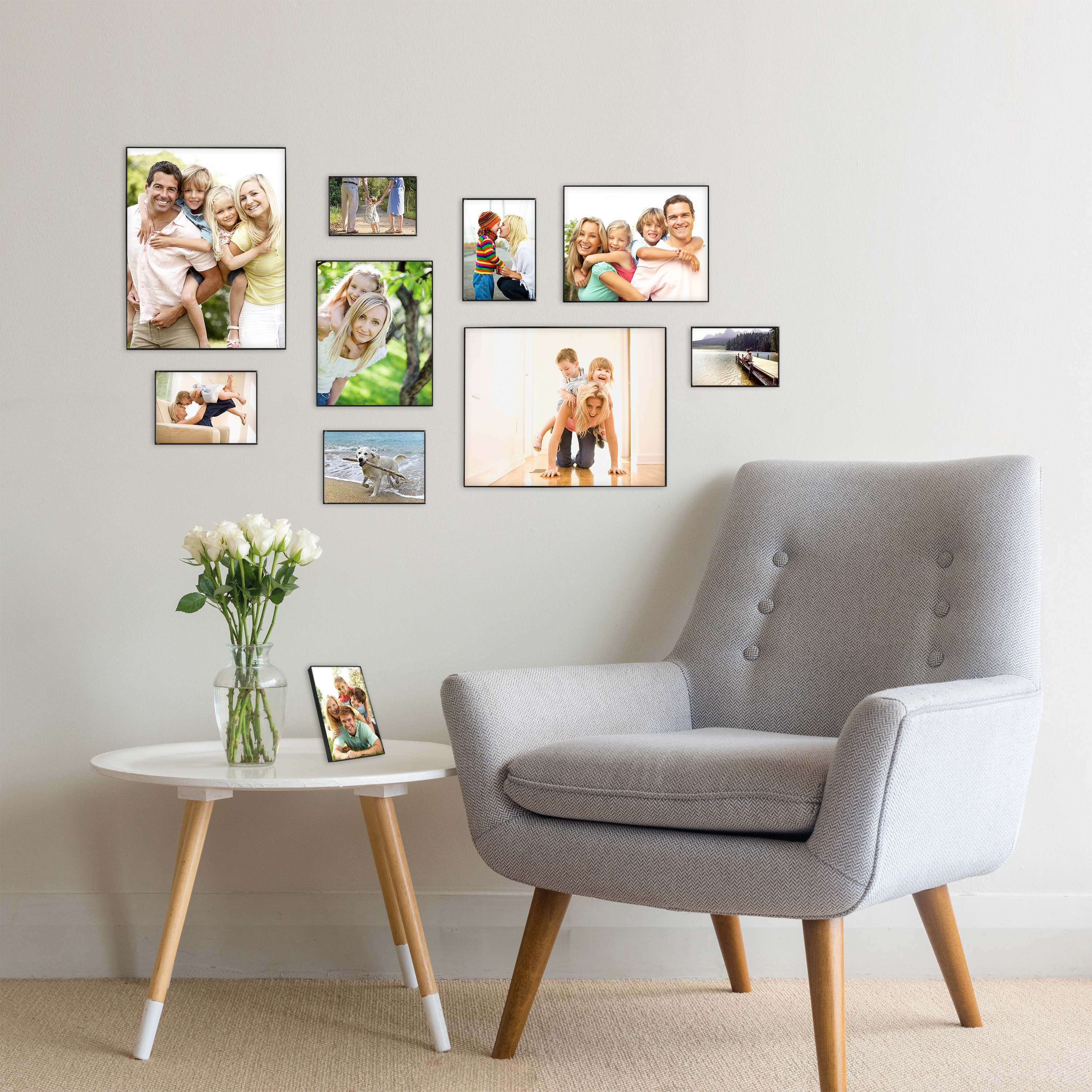 A gallery wall in a home with photos 