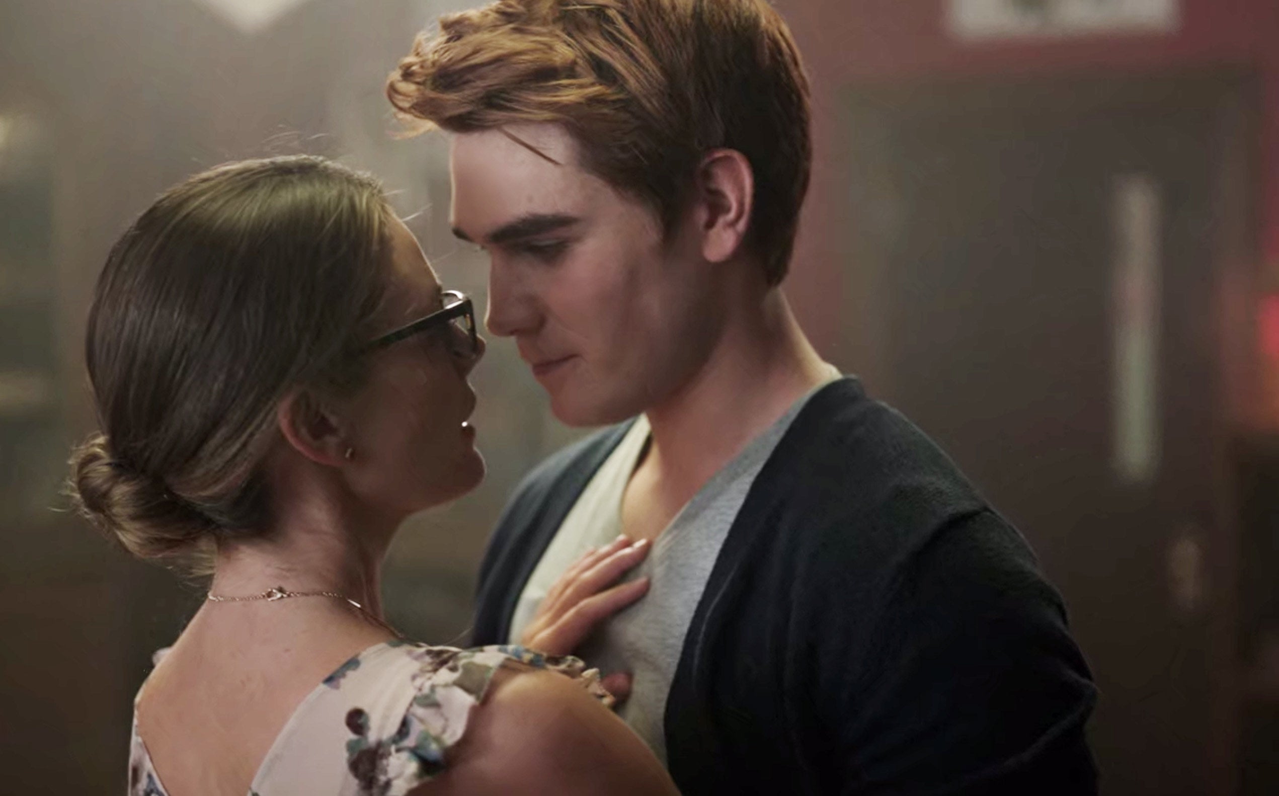 Archie and Ms. Grundy about to kiss