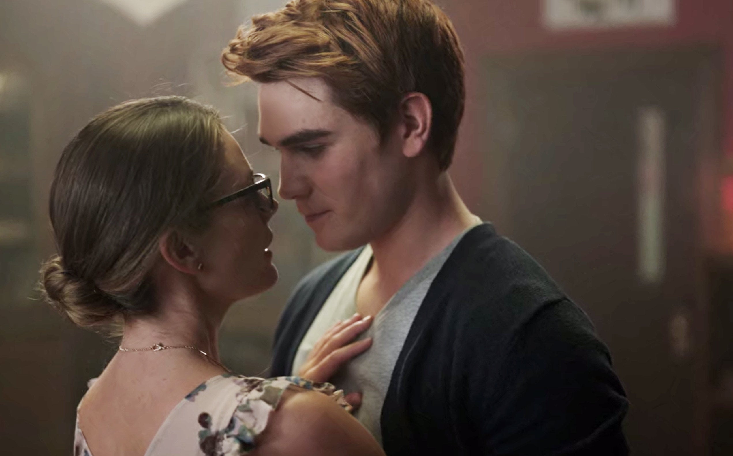 Archie and Ms. Grundy about to kiss