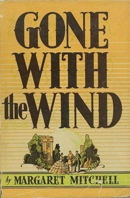 A trio talking between shrubs on the cover of Gone With the Wind