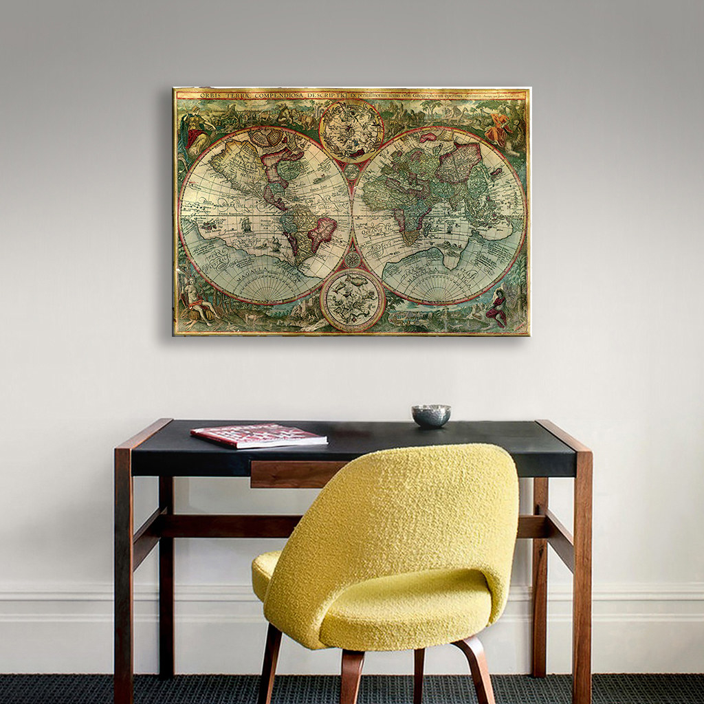 A map art canvas above a desk