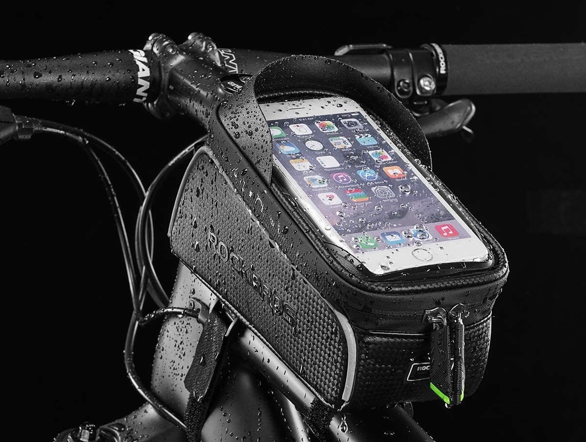 an iphone in the case on a bike that's wet