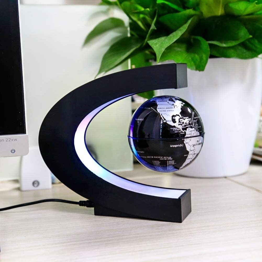 the globe in the magnetic base