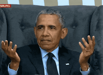 Obama making a face and gesturing out in confusion