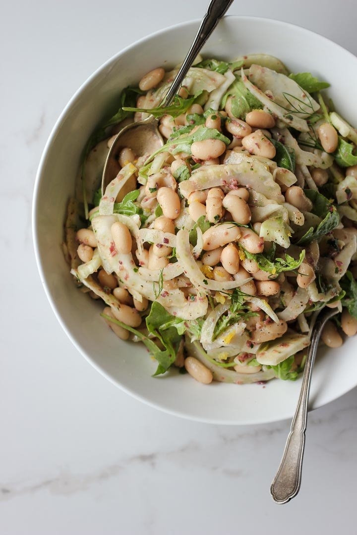A bowl of white bean salad with fennel