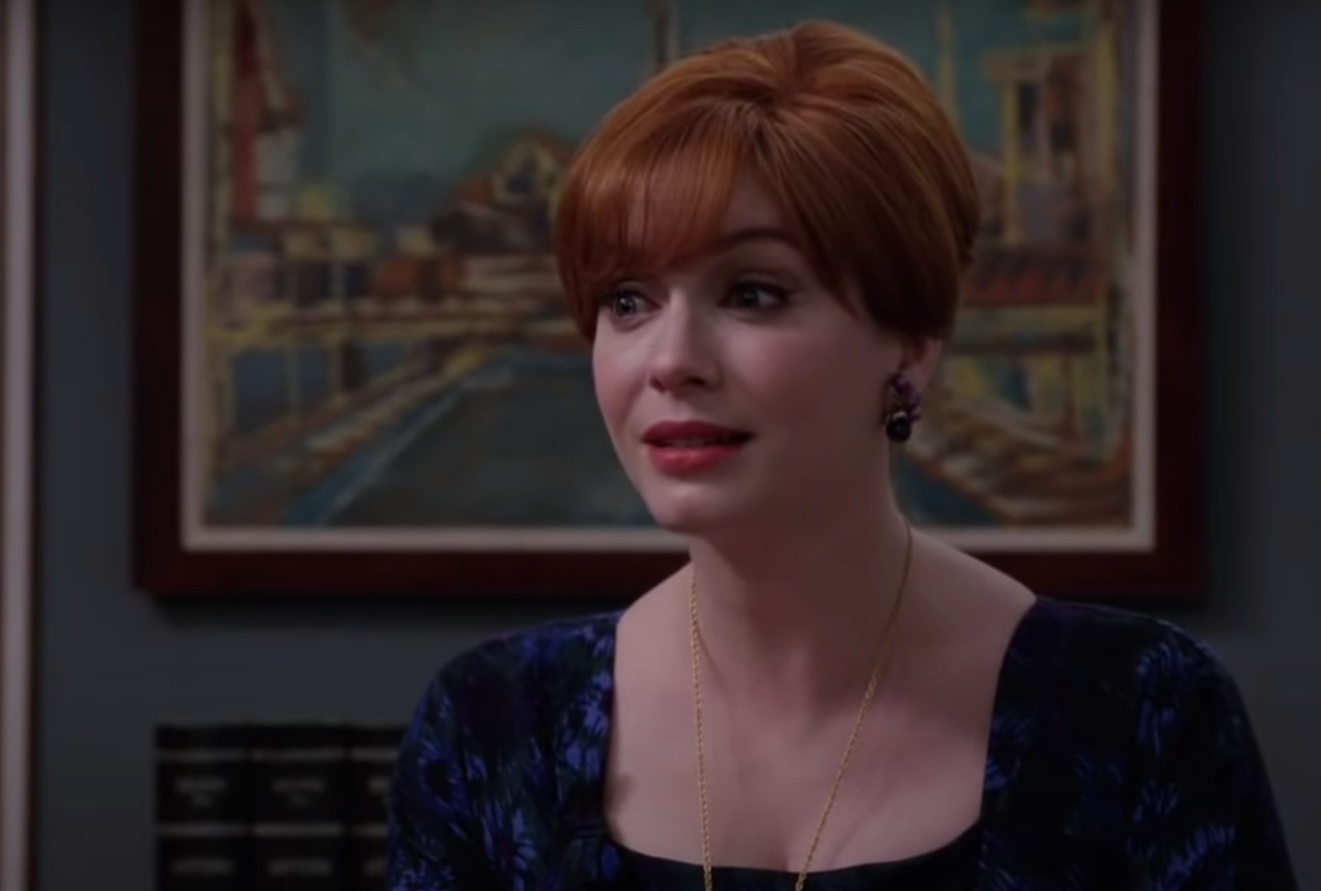 A screenshot of Christina playing Joan, while sitting in her office