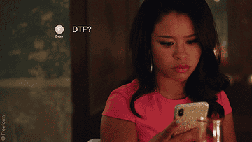 Mariana from &quot;Good Trouble&quot; looking at a text on her phone that says DTF