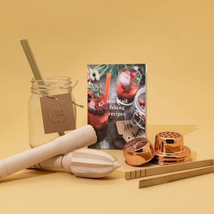 The complete mocktail making kit neatly arranged on a simple surface