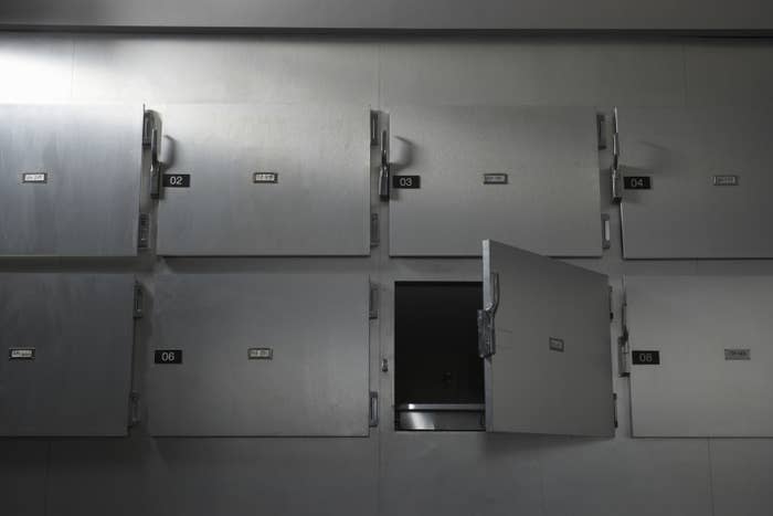 Morgue drawers with one open
