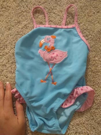 The same swimsuit now clean and without stains