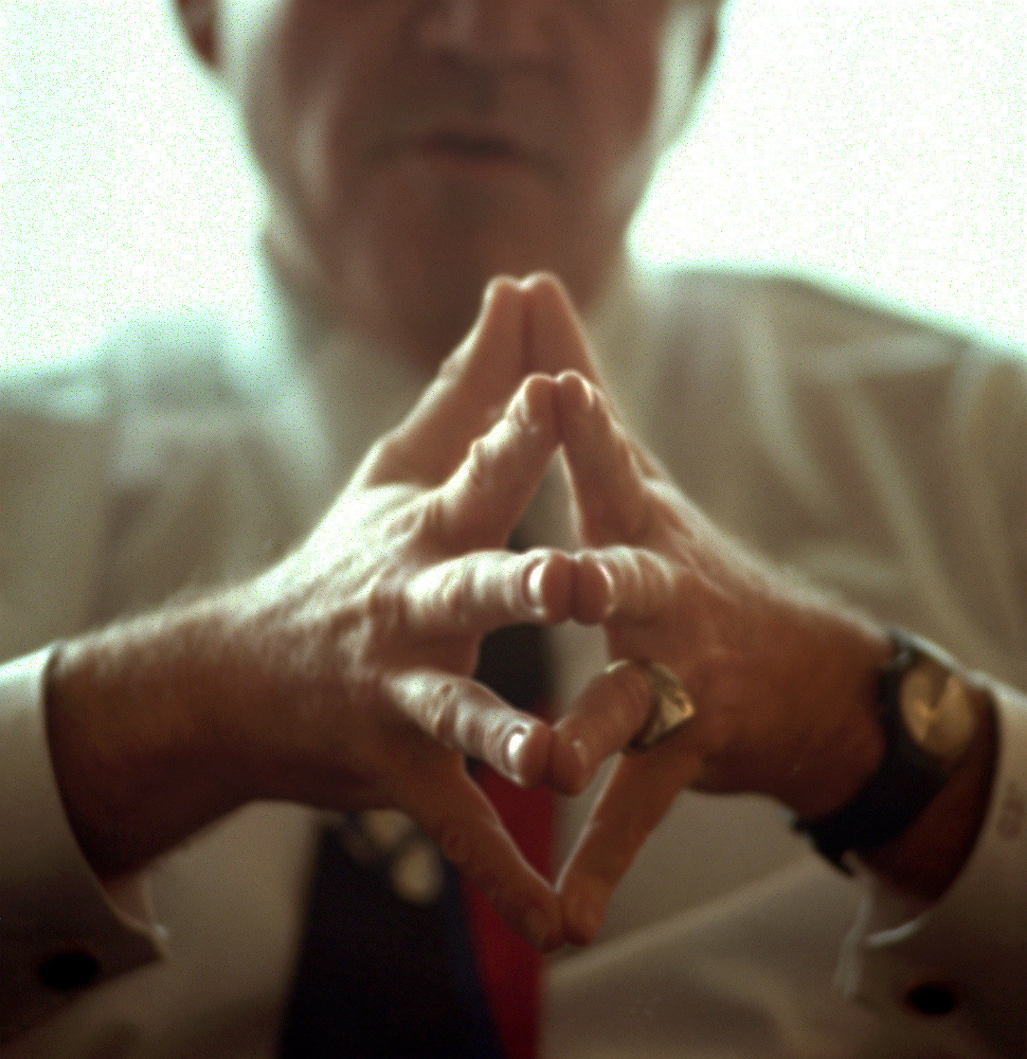 John Douglas&#x27; hands pressed together in a photo taken for his book release