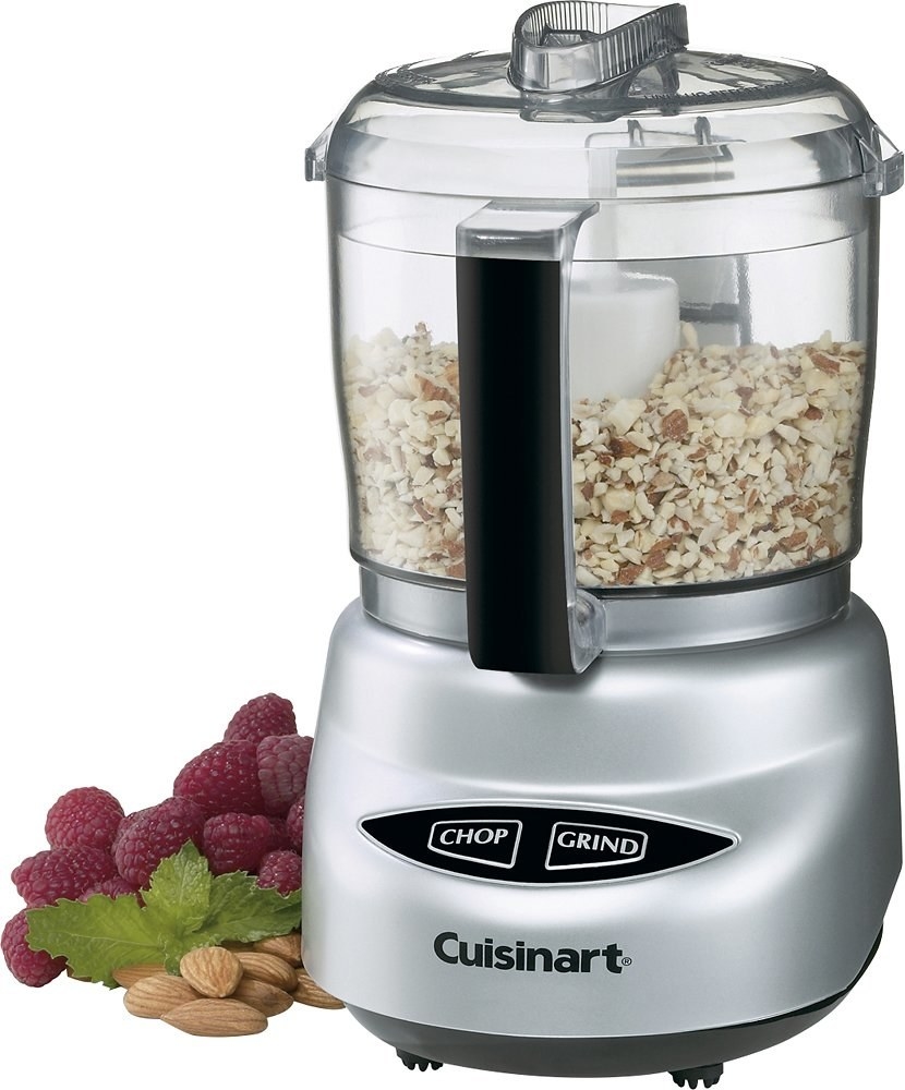 brushed chrome food chopper with chipped nuts inside