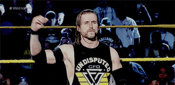 Adam Cole points to himself and says &quot;boom&quot;