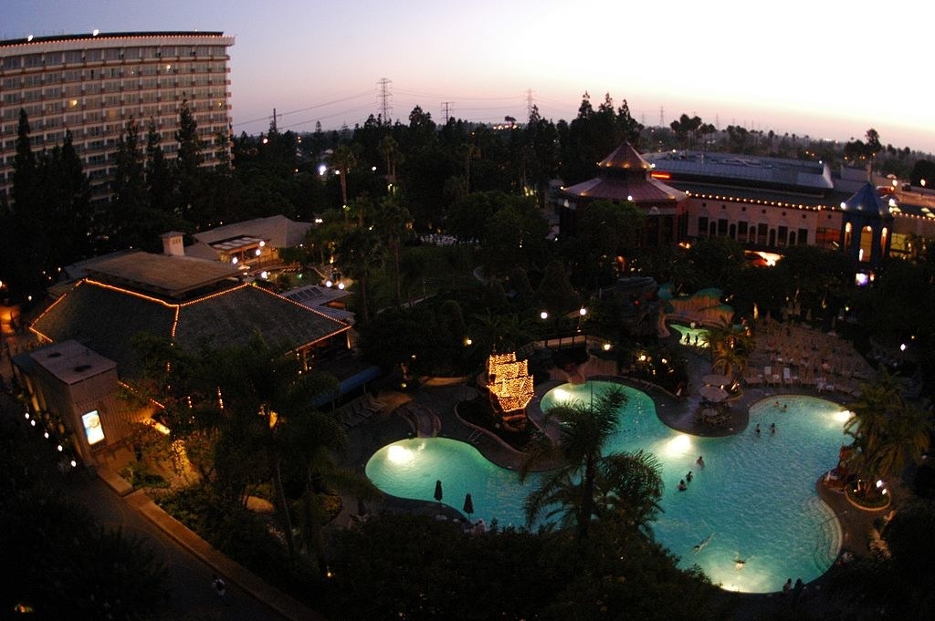 Overhead view of a Disney resort pool at night