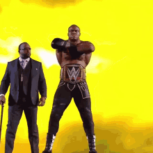 Bobby Lashley pointing with WWE Championship around his waist