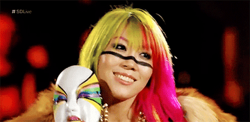 Asuka removes her mask
