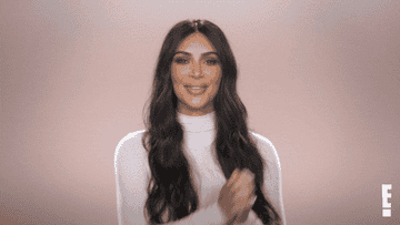Kim Kardashian cheers, &quot;YAY!&quot; during a &quot;Keeping Up with The Kardashians&quot; interview