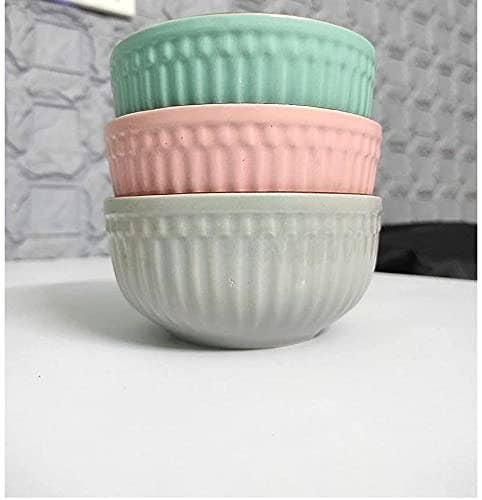 Blue, pink and white ceramic bowls.