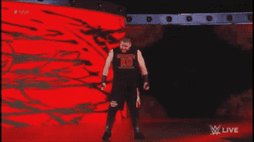 Kevin Owens walks to the ring