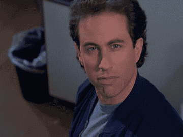 Gif of Seinfeld looking grimly surprised