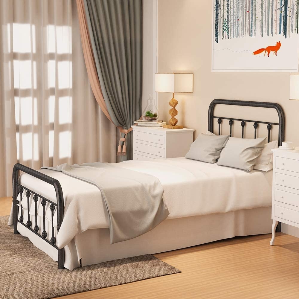bed frame with made up bed