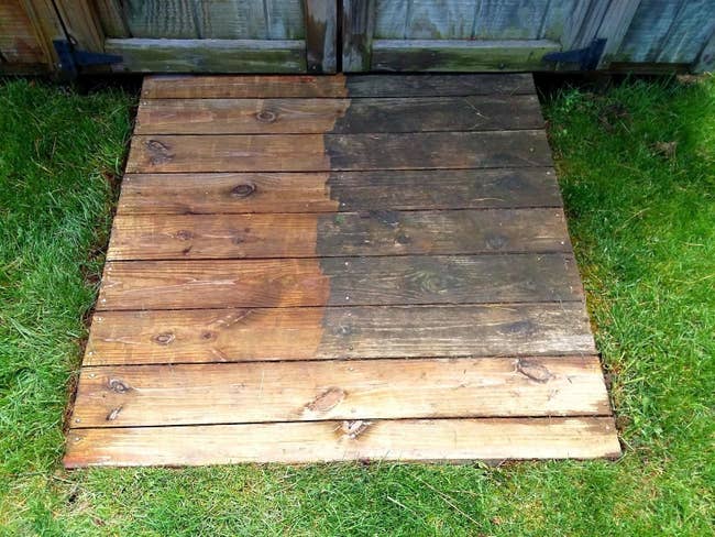 Reviewer photo of wood planks and you can clearly see where it's been cleaned with the pressure washer