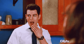 Schmidt and Nick from &quot;New Girl&quot; making jaw dropping faces.