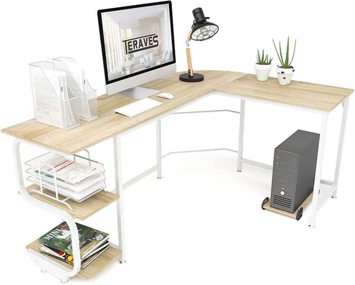 Wooden  L shaped desk with white legs and detailing