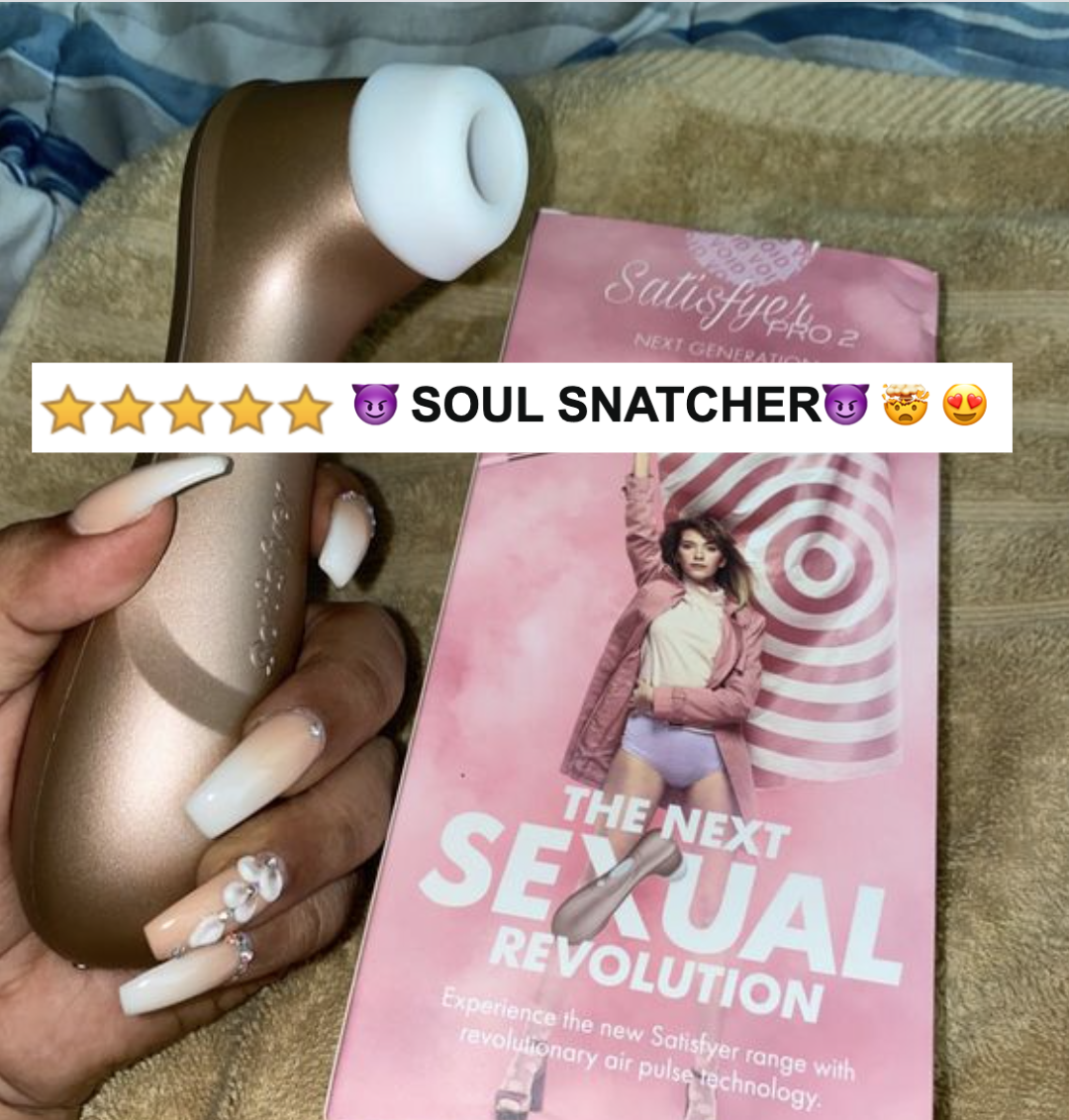 reviewer holding the vibrator with five-star caption &quot;soul snatcher&quot;