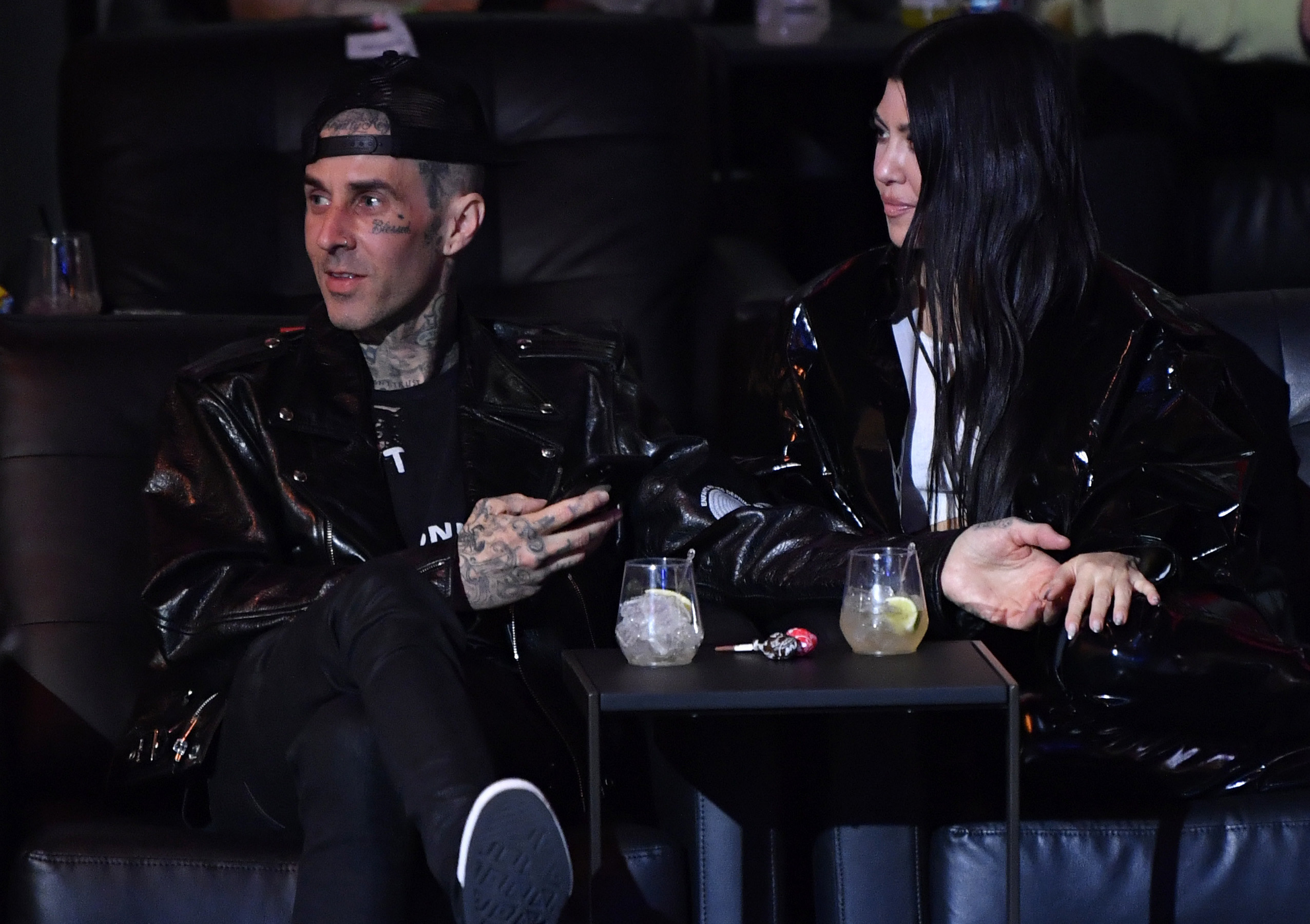 Travis Barker and Kourtney Kardashian are seen in attendance during the UFC 260 event at UFC APEX on March 27, 2021 in Las Vegas, Nevada