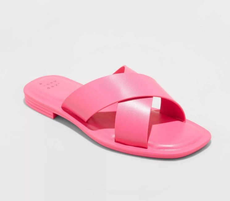 A pair of crossband slide sandals