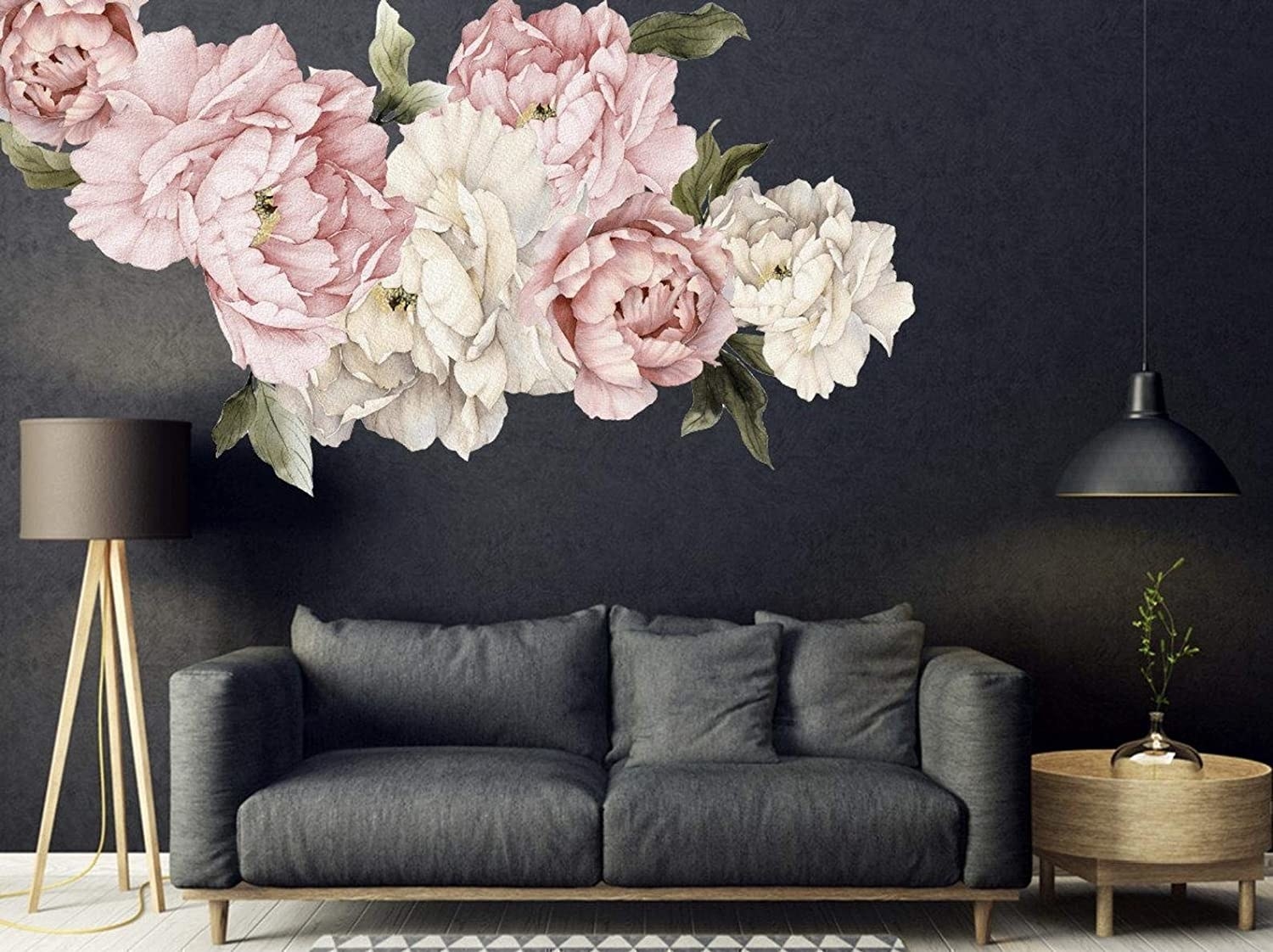 black wall with a large pink and white peony wall sticker on it that looks like a mural