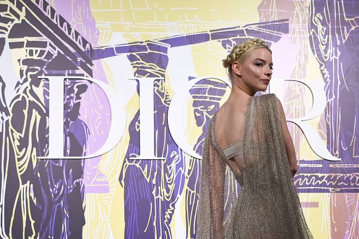 Anya Taylor-Joy poses at the Dior fashion show in Athens, Greece