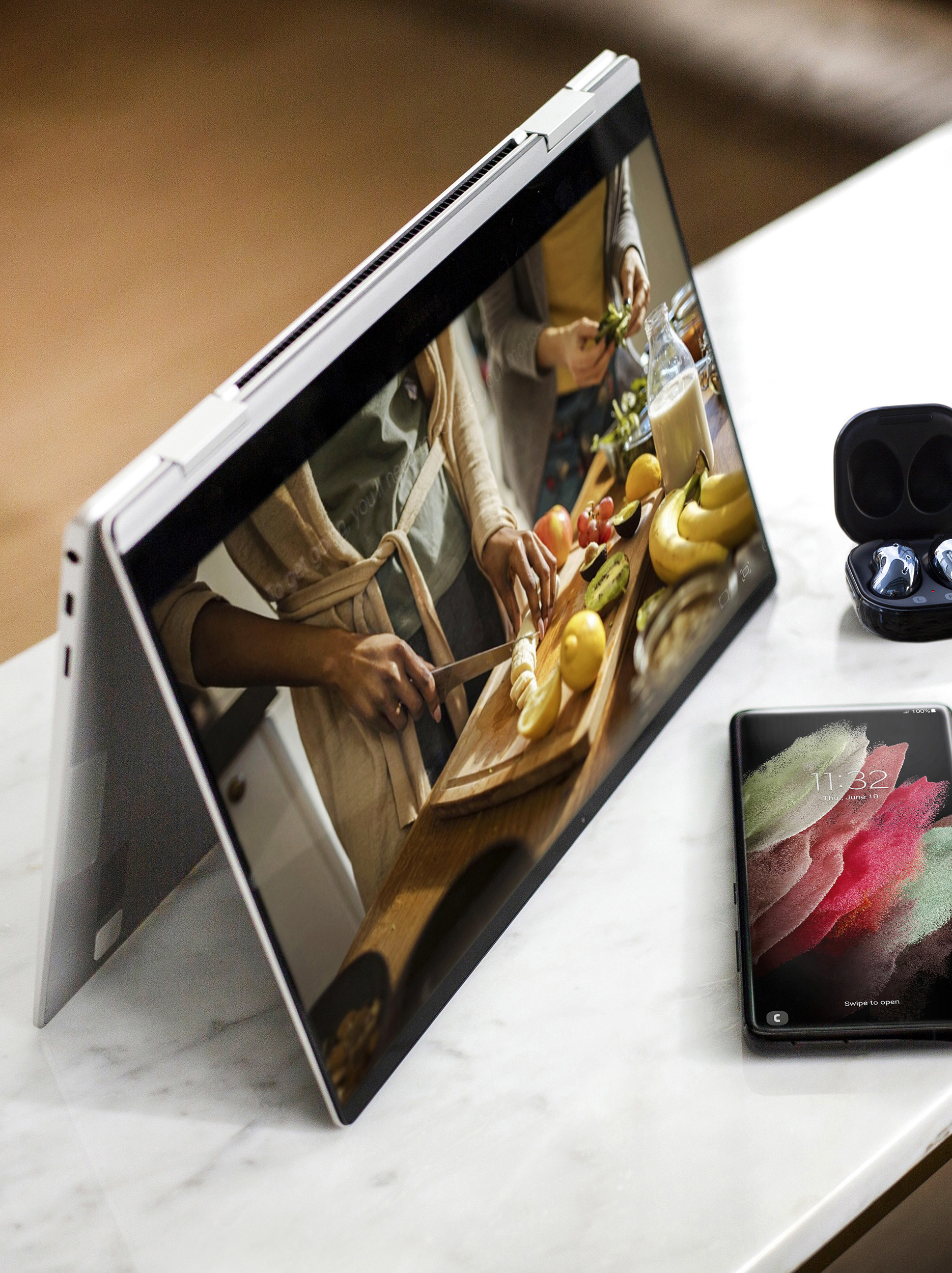 A tablet propped up playing a cooking video